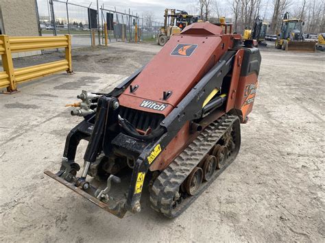 ditch witch stand on skid steer|ditch witch 1050 for sale.